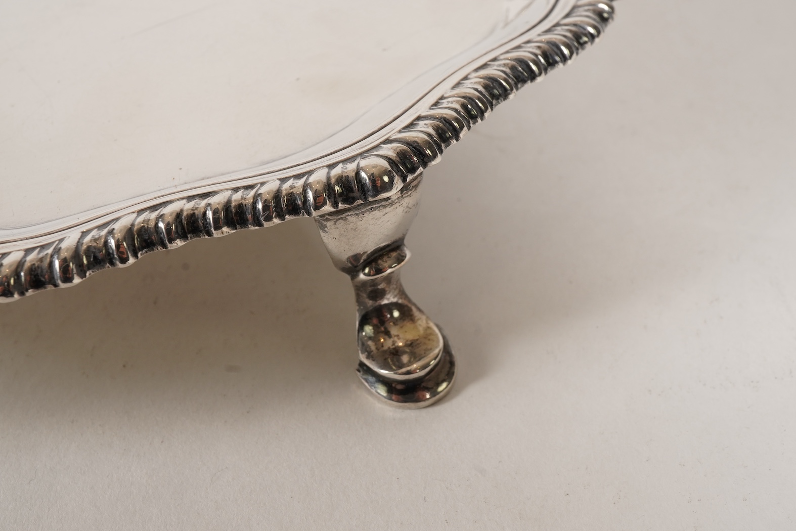 A George V silver salver, by Harrods Ltd